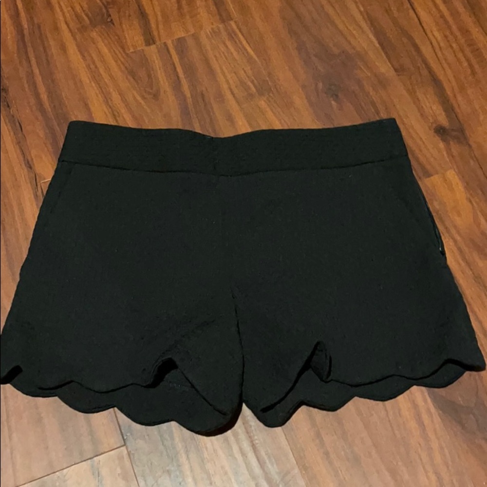 Black scalloped shorts